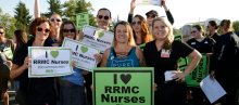 RRMC nurses and family members holding signs that say I heart RRMc nurses